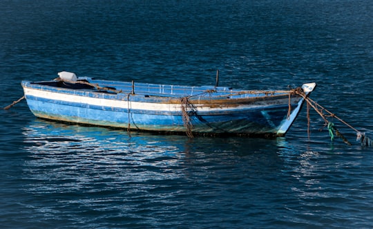 white and brown boat on sea during daytime in Rabat Morocco