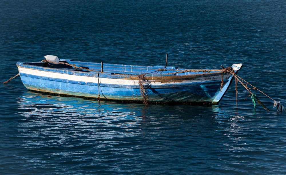 white and brown boat on sea during daytime