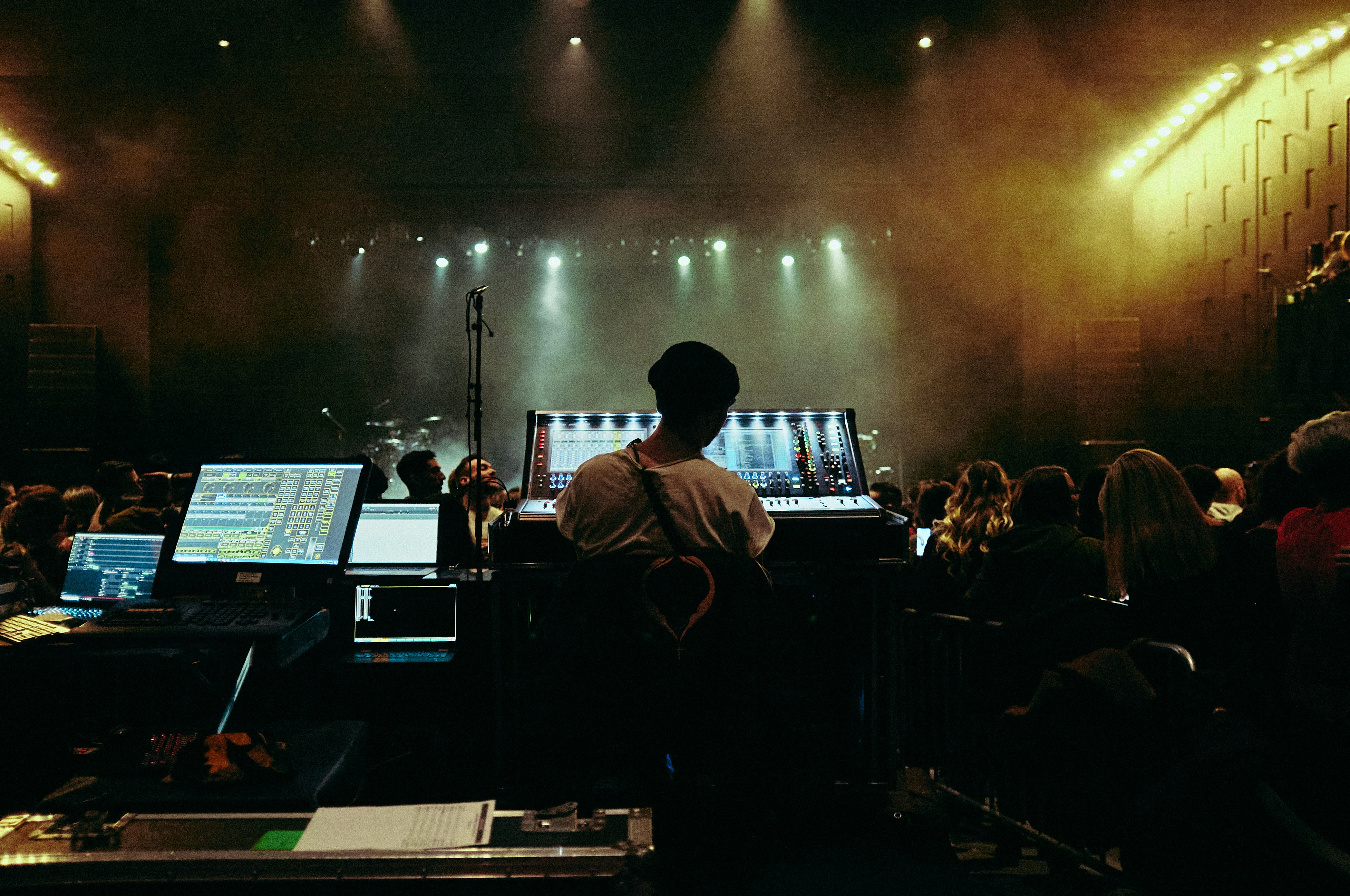 woman wearing yellow long-sleeved dress under white clouds and blue sky during daytime