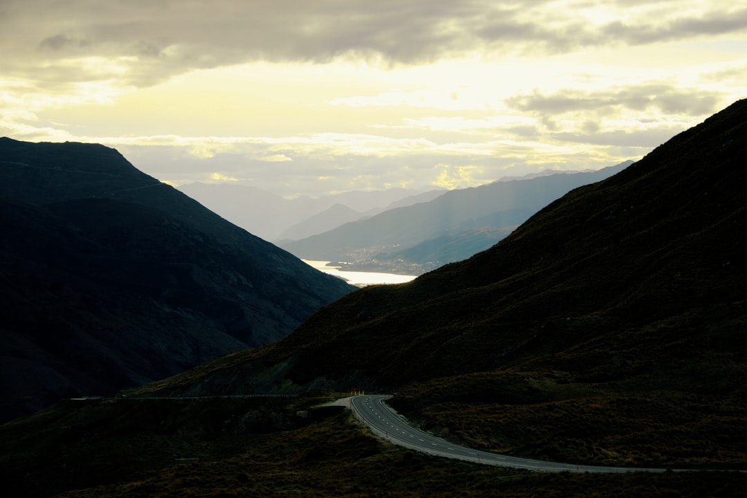 green mountains under white clouds during daytime