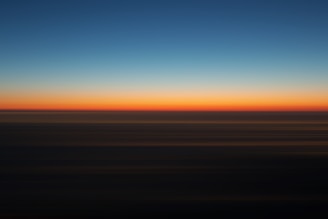 blue and orange sky during sunset