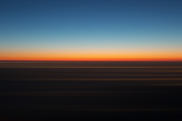 blue and orange sky during sunset
