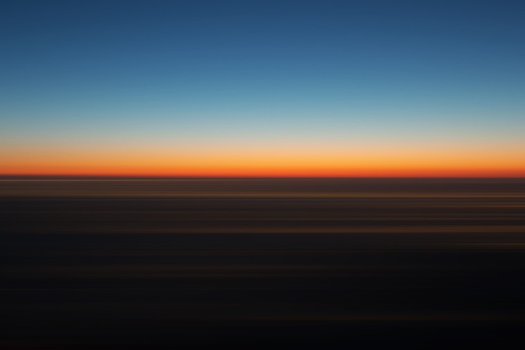 blue and orange sky during sunset