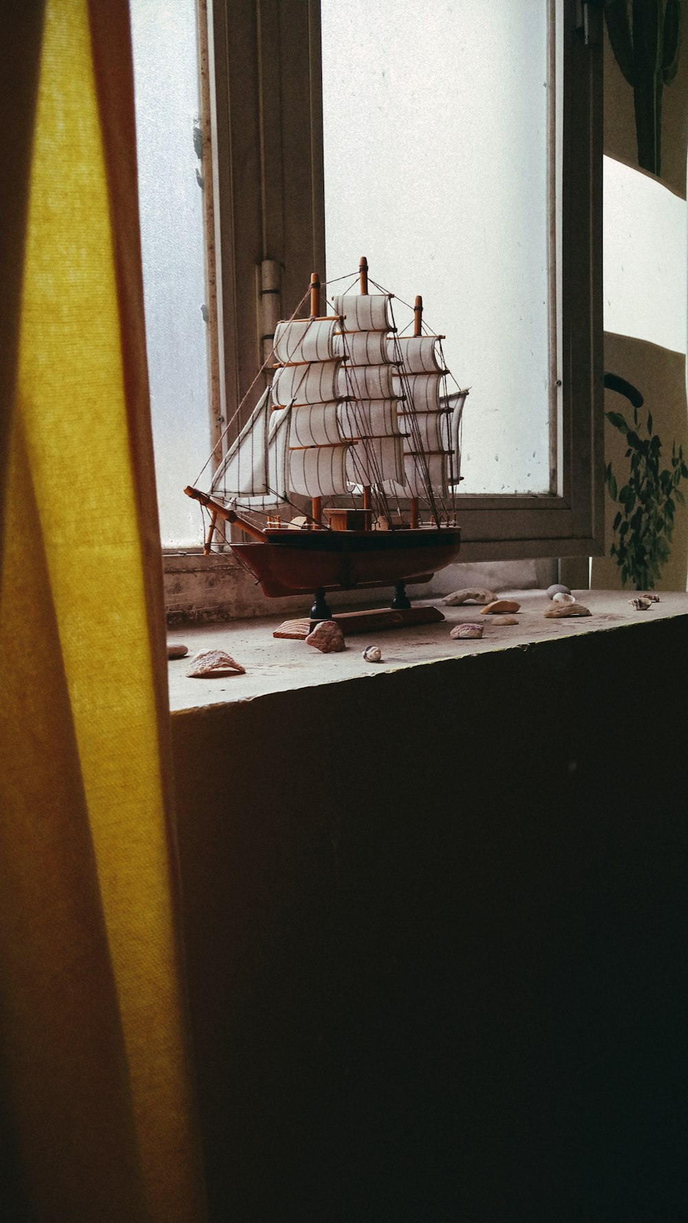 brown and white galleon ship scale model
