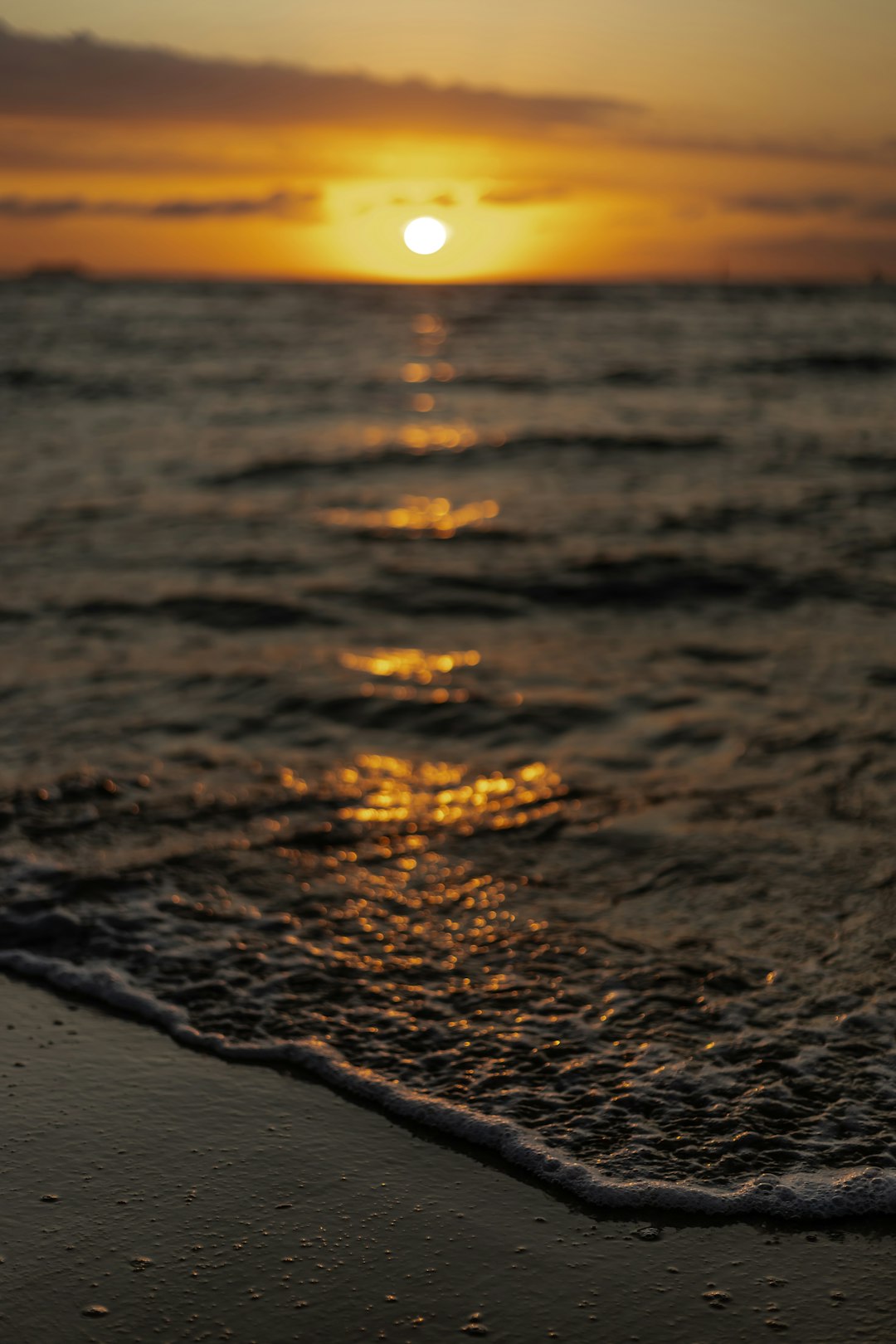 body of water during sunset