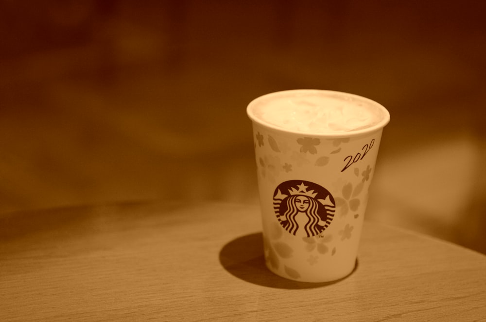 white and green floral cup