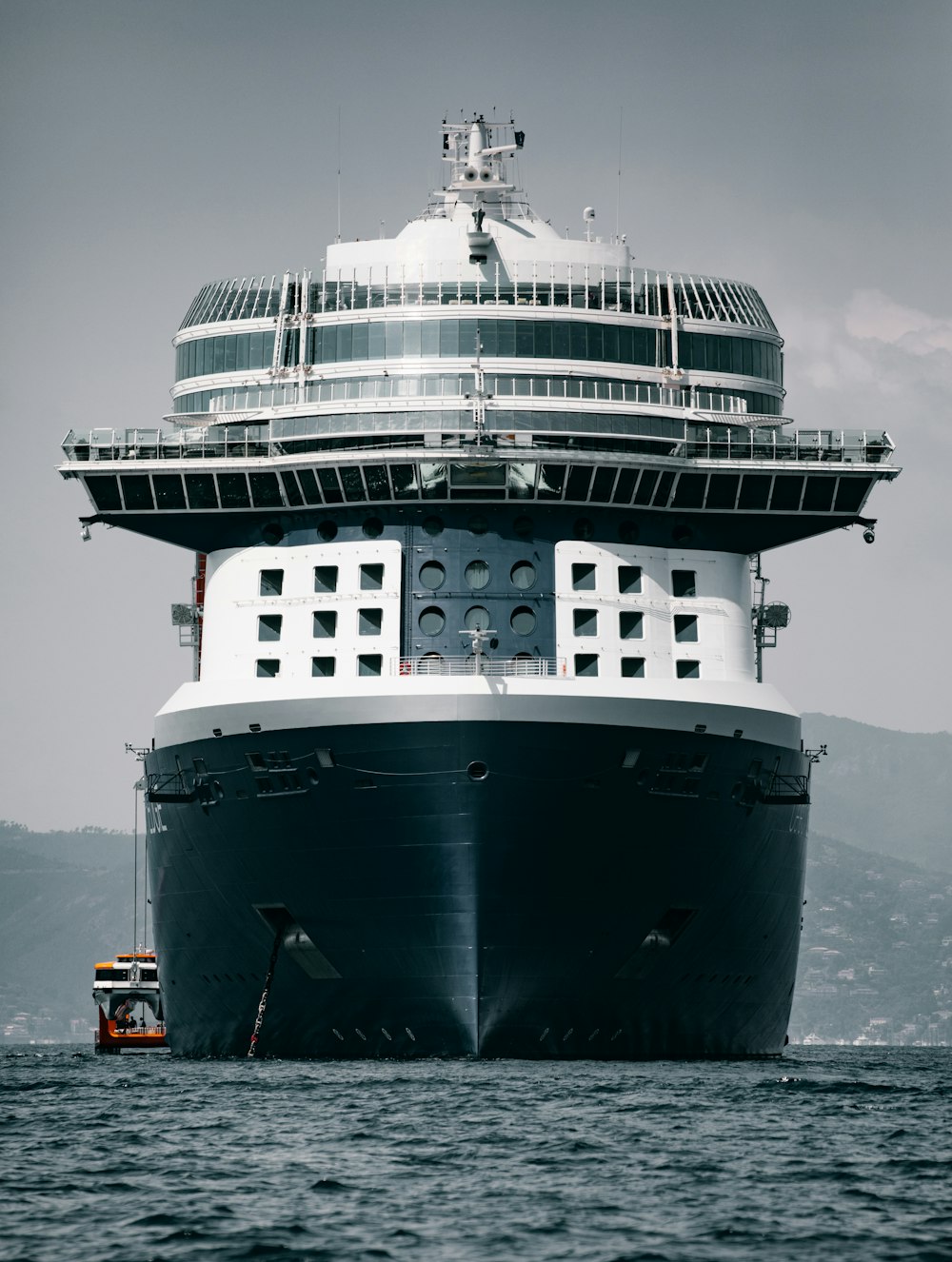 black and white ship on sea during daytime