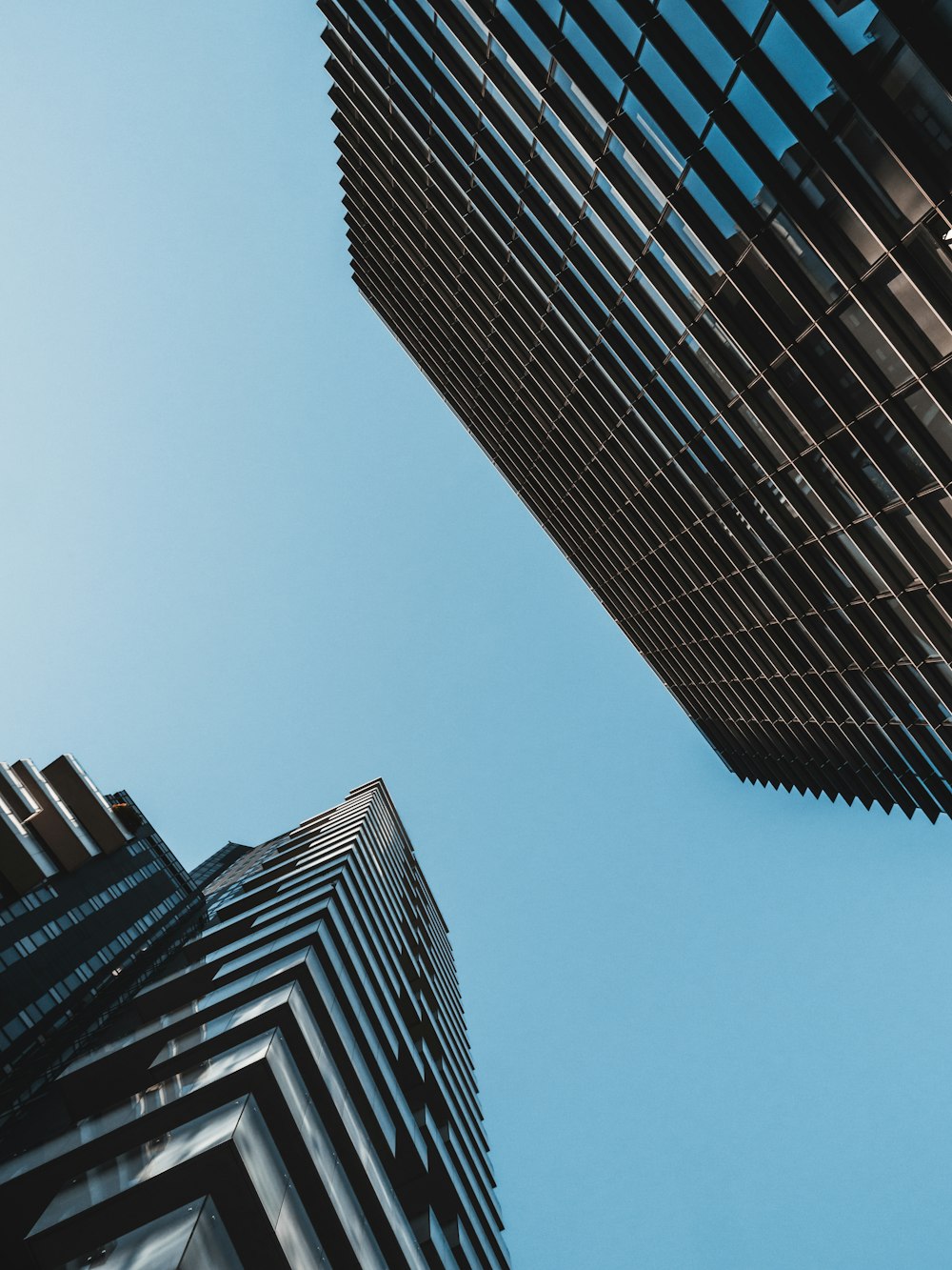 low angle photography of high rise building