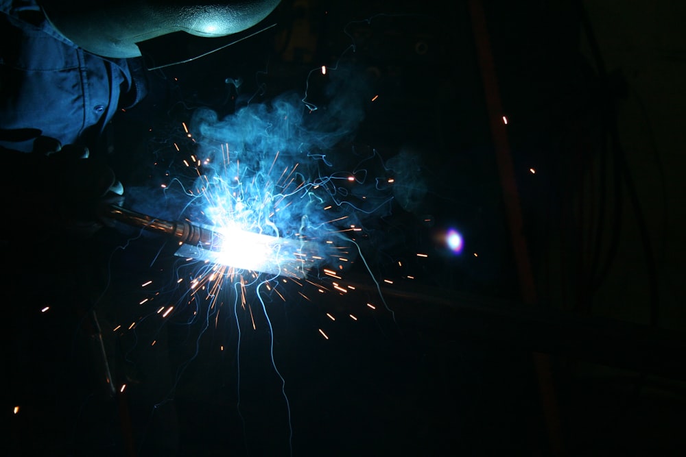 white and blue fireworks display during nighttime