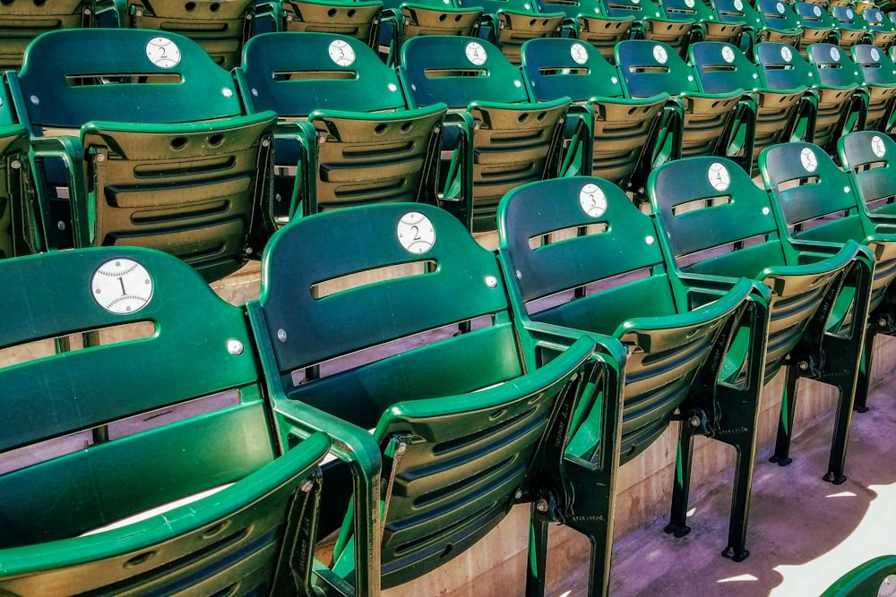 green and brown folding chairs