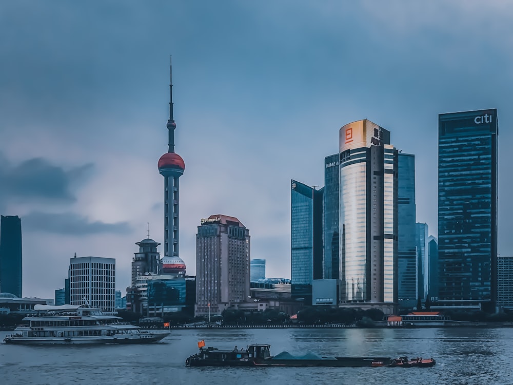 high rise buildings near body of water during daytime