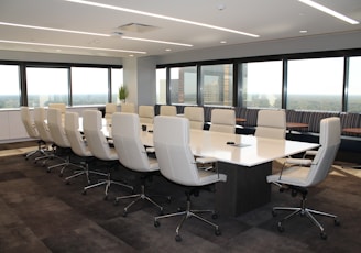 white and gray office rolling chairs