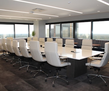 white and gray office rolling chairs