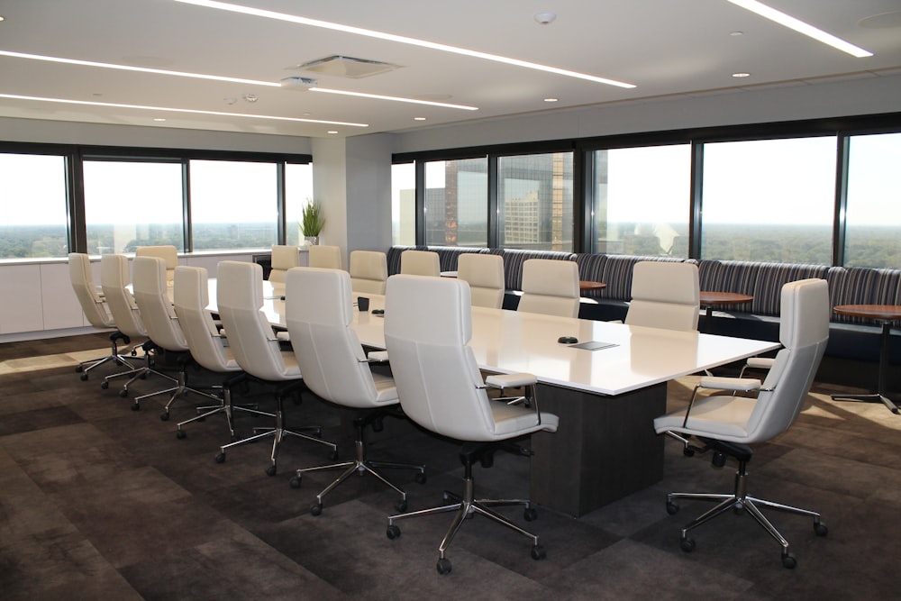 white and gray office rolling chairs