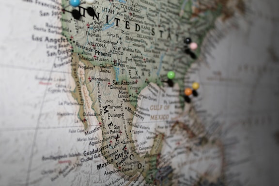 green and brown map with water droplets