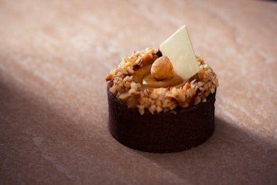 Ferrero-inspired chocolate egg with hazelnut pieces and smooth ganache.