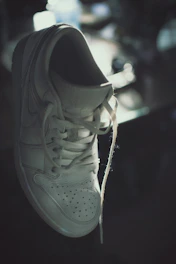 Light blue sneakers displayed on a clean white background with soft shadows.