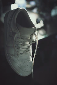Light blue sneakers displayed on a clean white background with soft shadows.