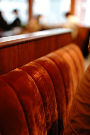 brown wooden chair in tilt shift lens