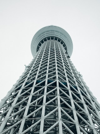 low angle photography of gray high rise building