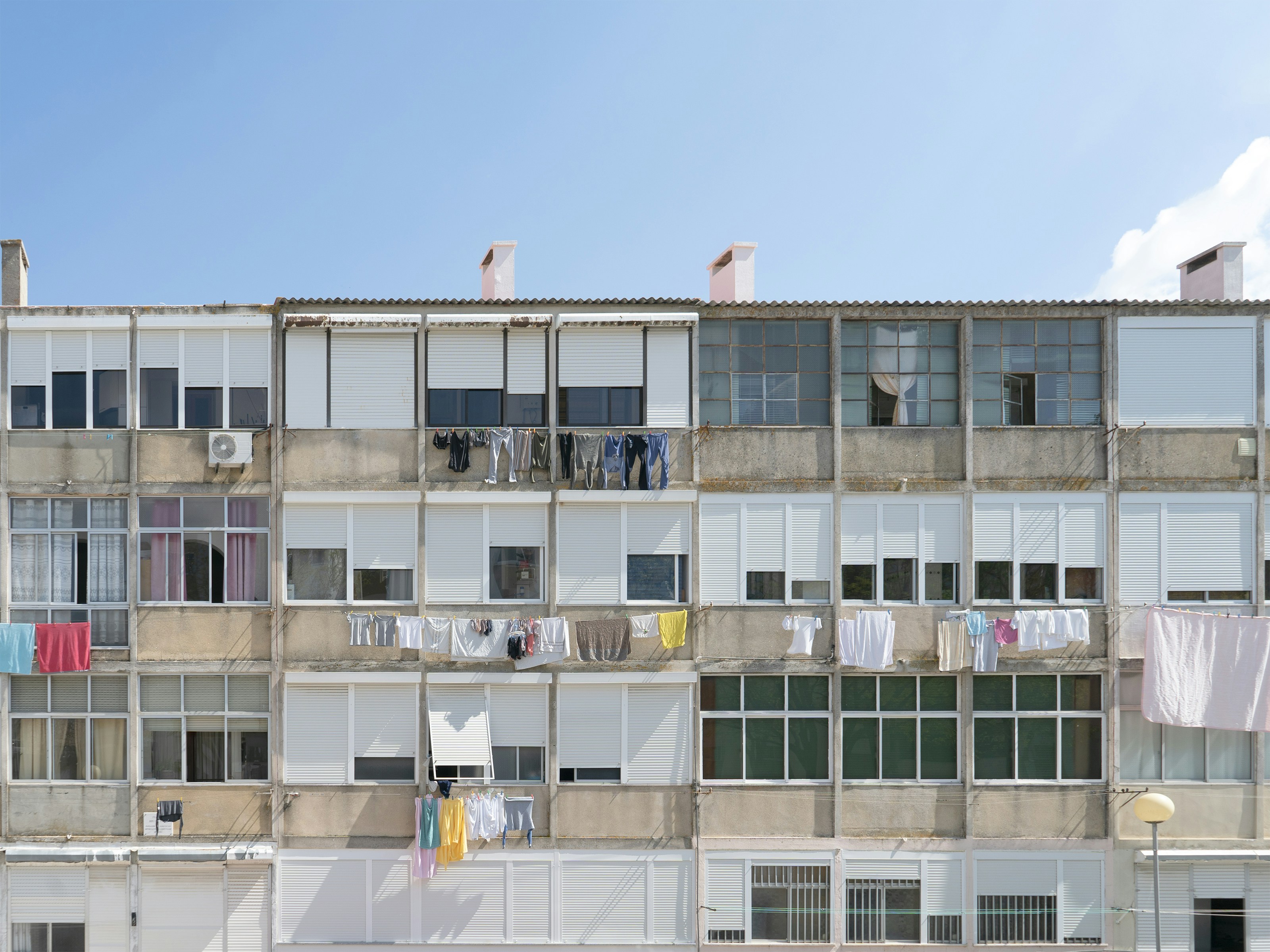 white concrete building under blue sky during daytime