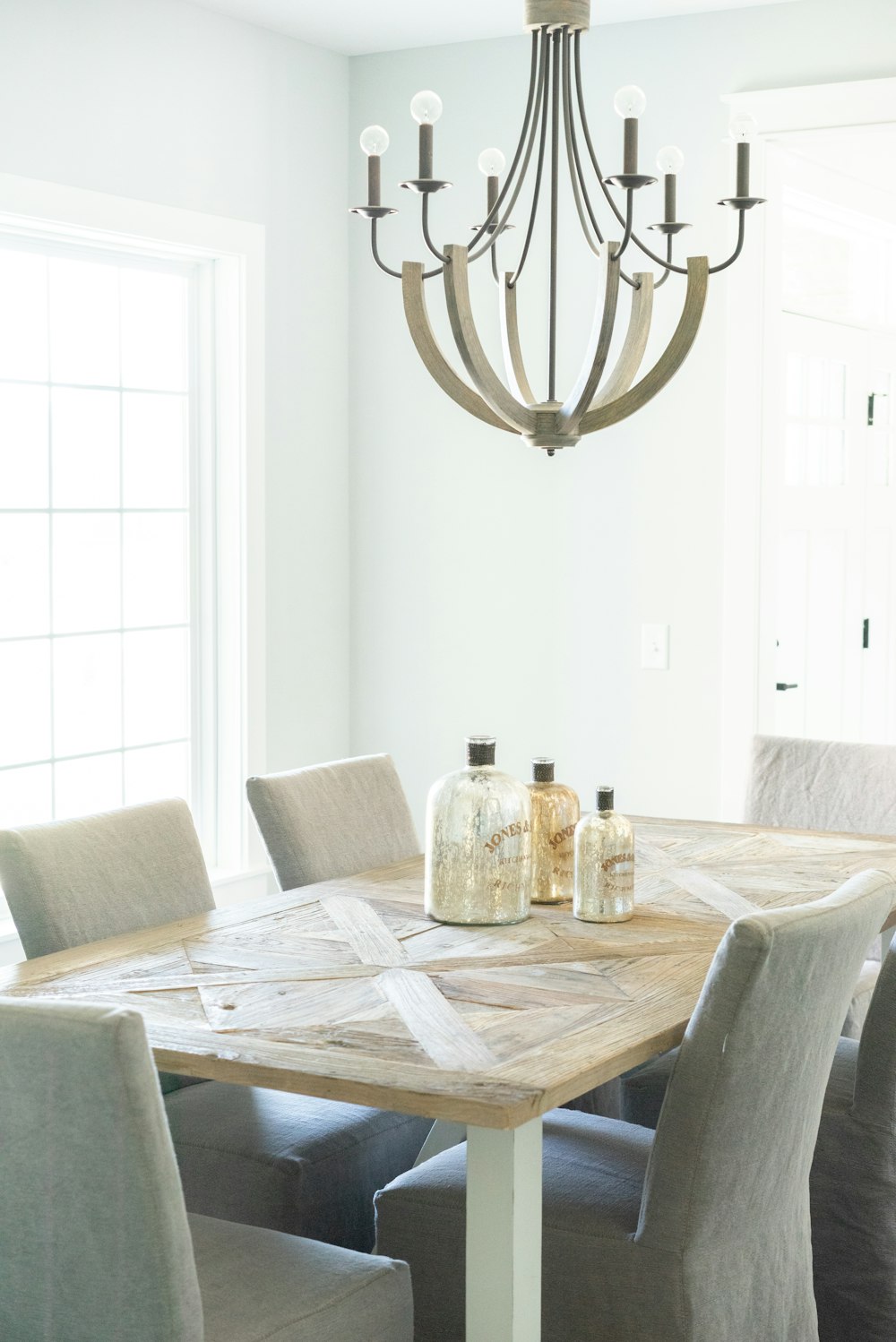 clear glass bottles on table