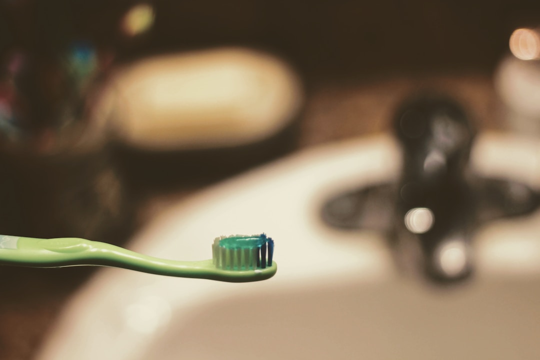 A toothbrush with toothpaste ready for brushing