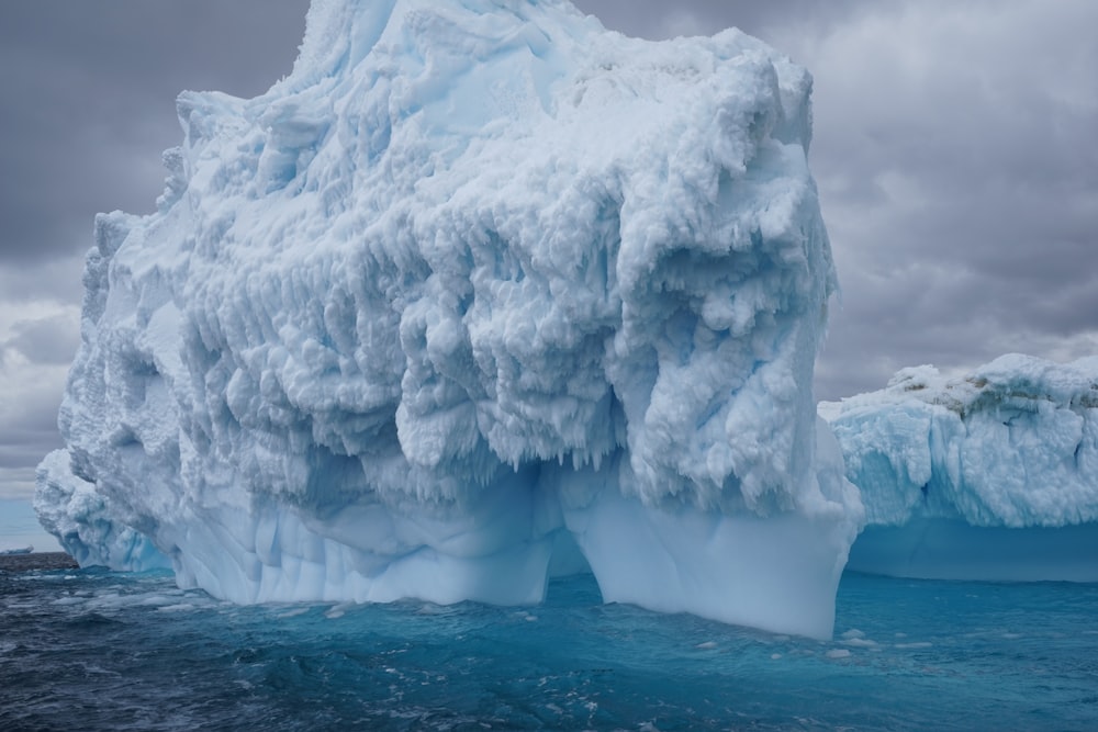 white ice on blue water