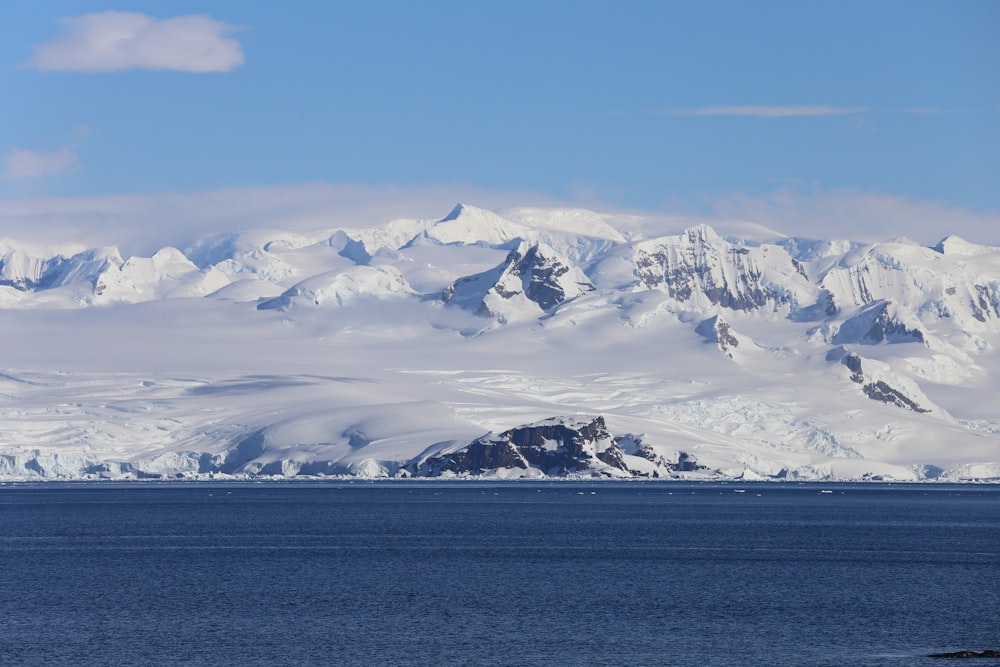 snow covered mountain during daytime