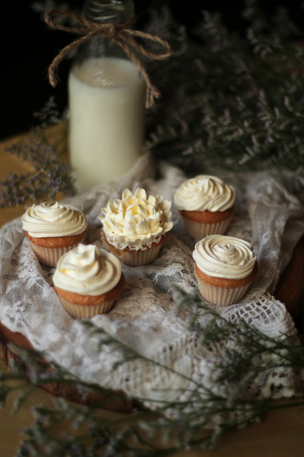 cupcakes on gray and white textile