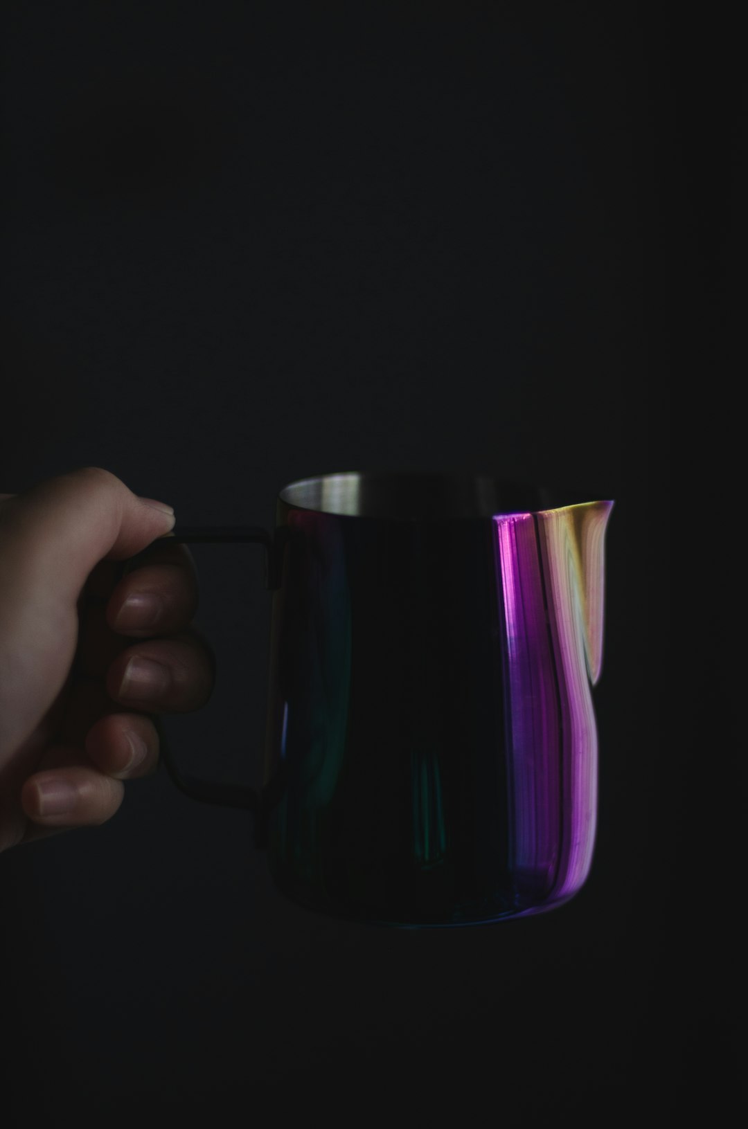 purple and black ceramic mug