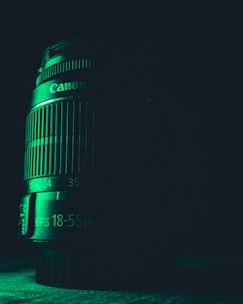 A close-up of a camera lens capturing a cinematic scene.