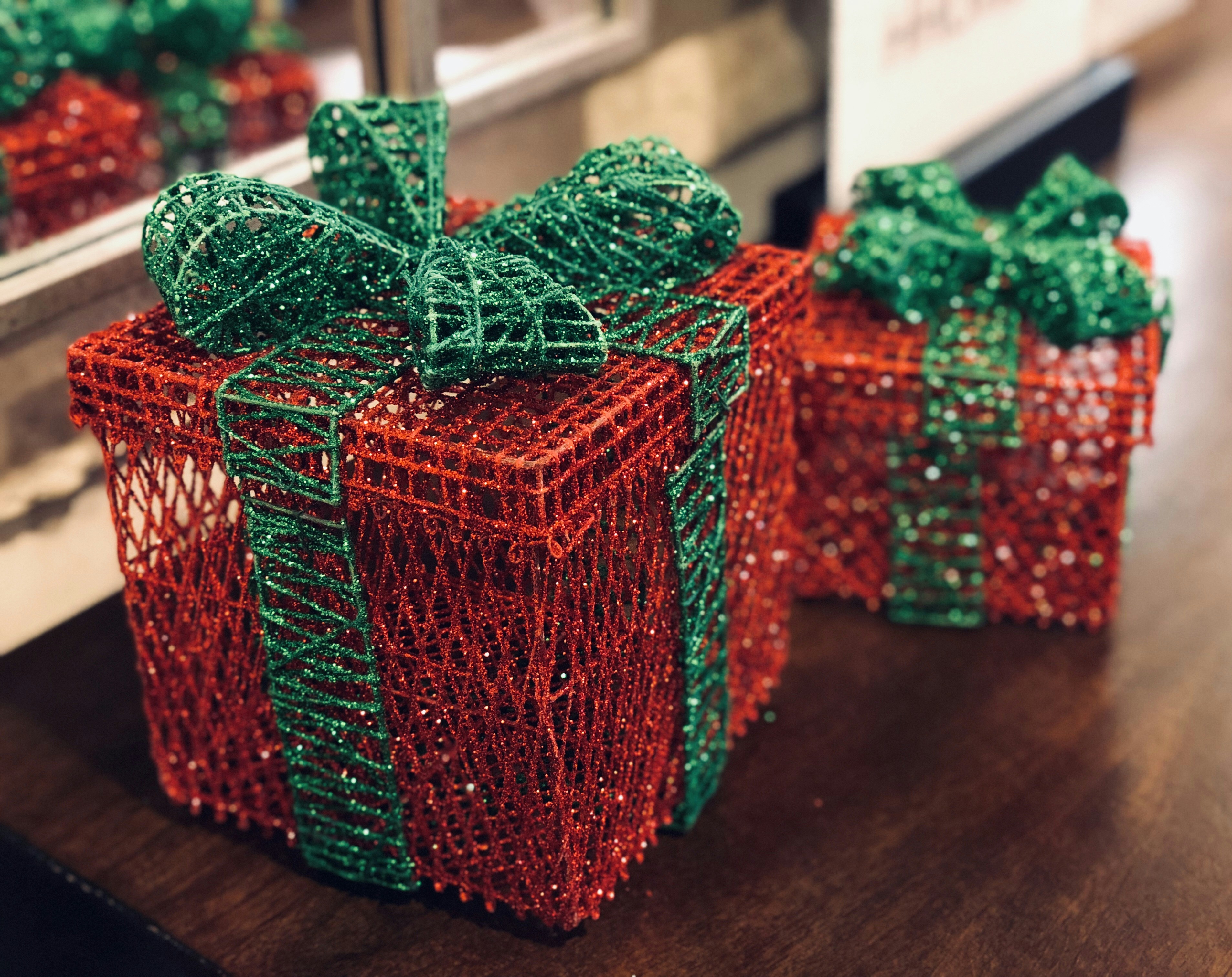 red and green knit textile on brown wooden table