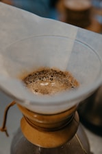 white powder in clear glass container