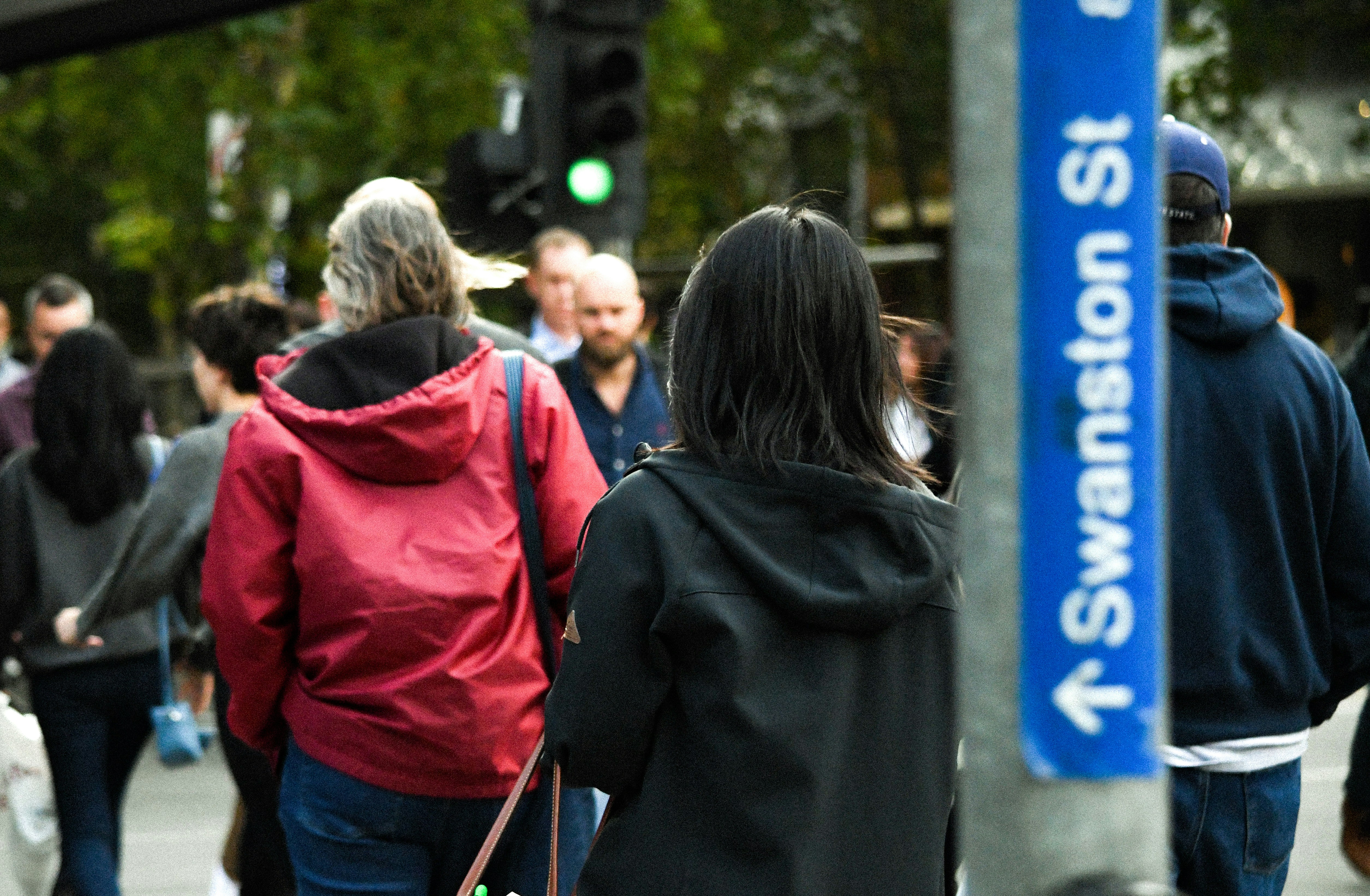 people walking on sidewalk during daytime