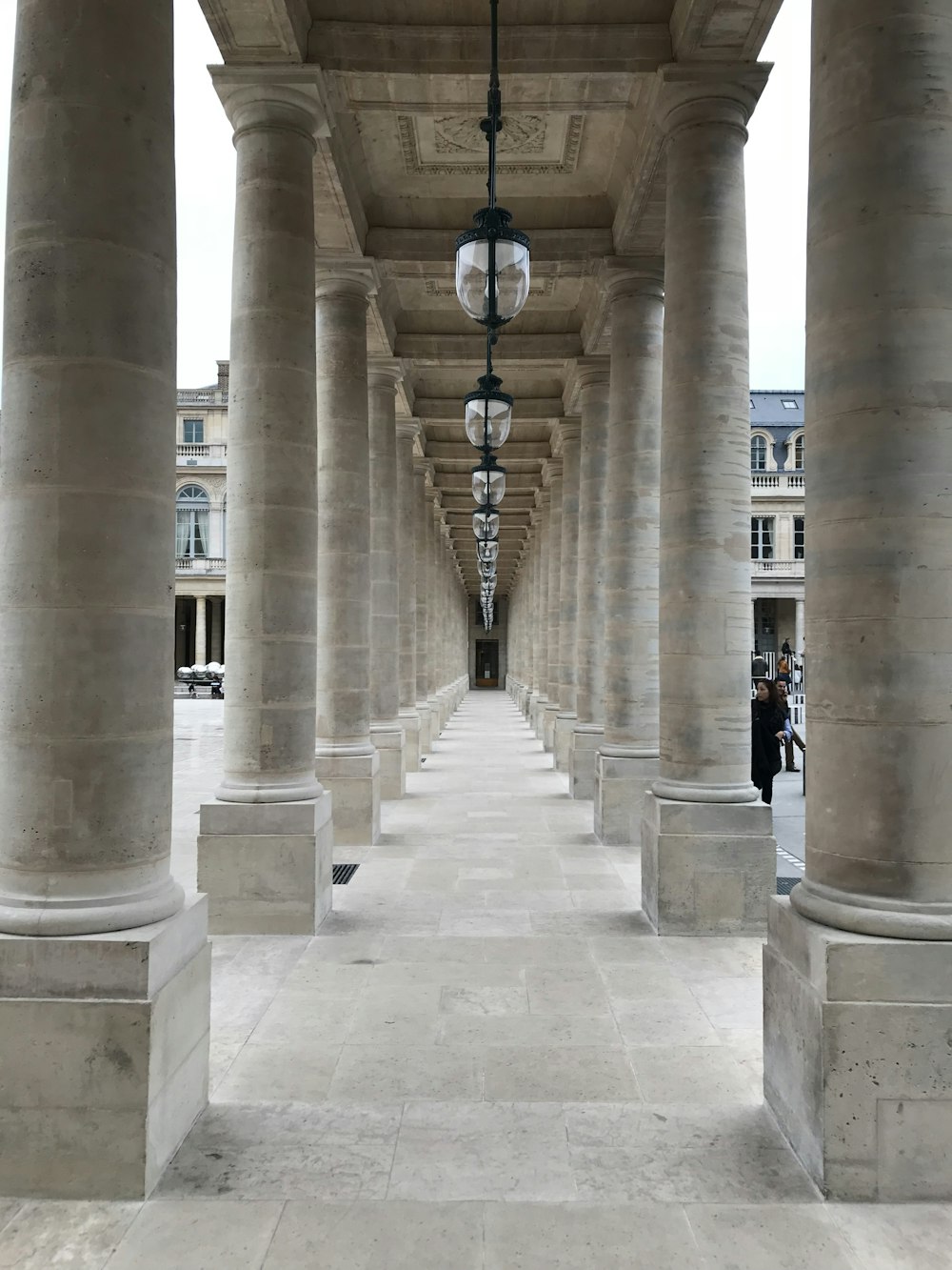 white concrete pillars during daytime