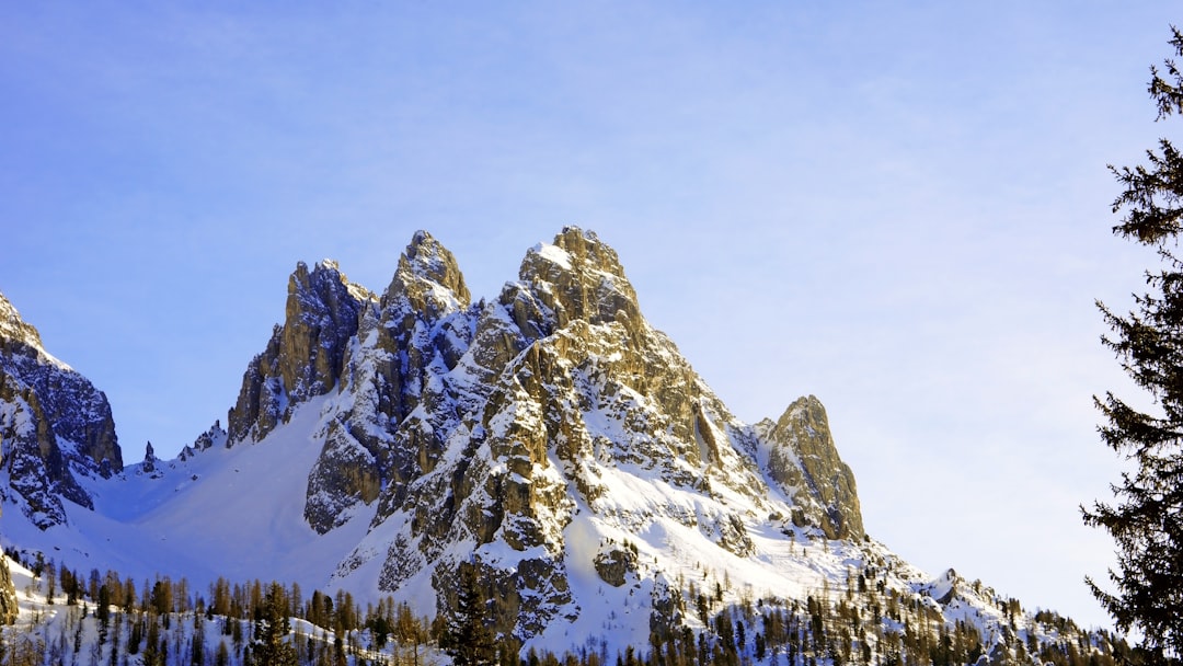 snow covered mountain during daytime