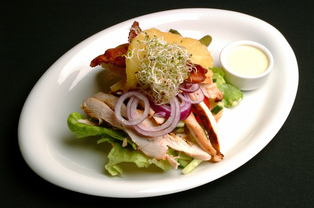 vegetable salad on white ceramic plate