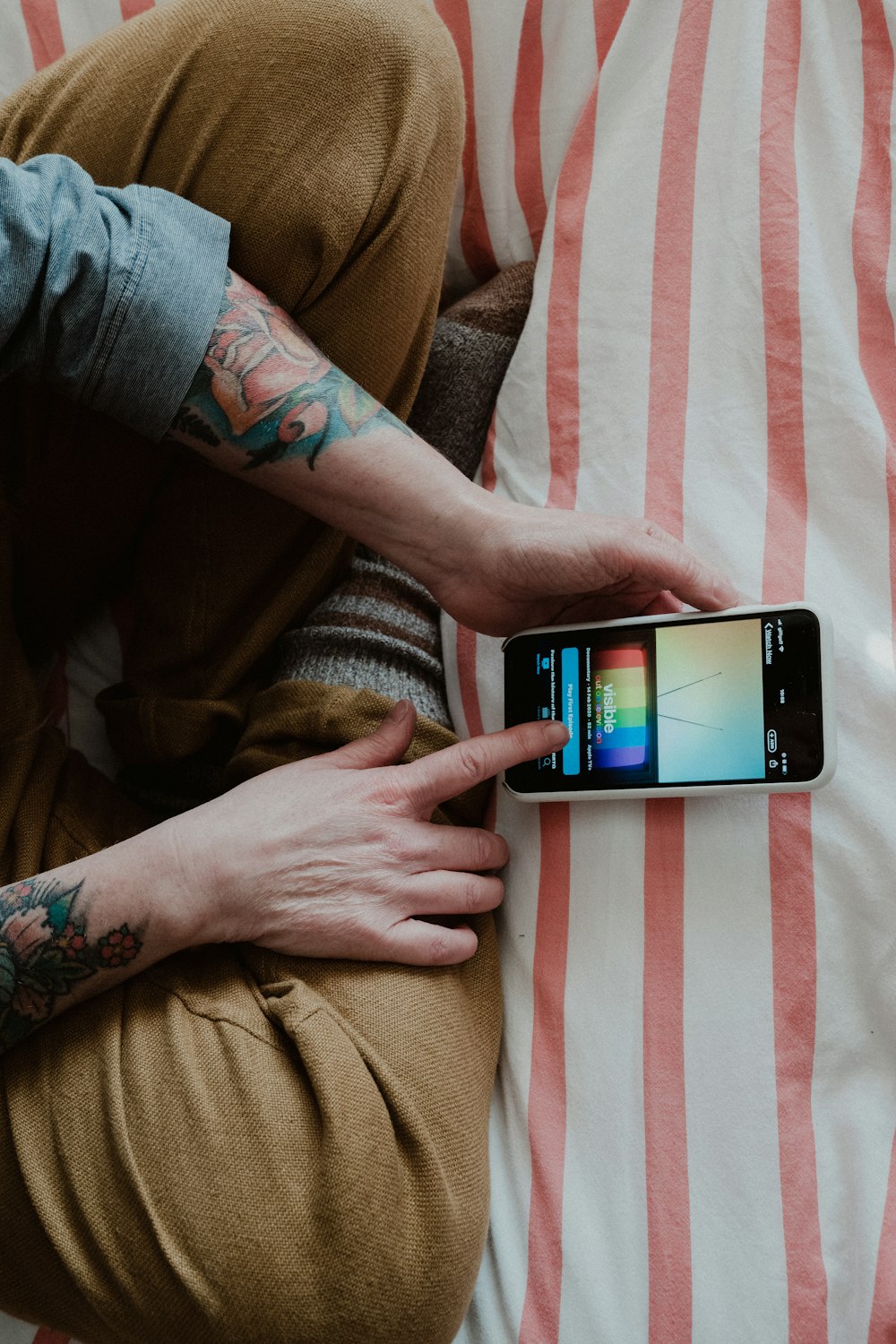 person holding silver iphone 6