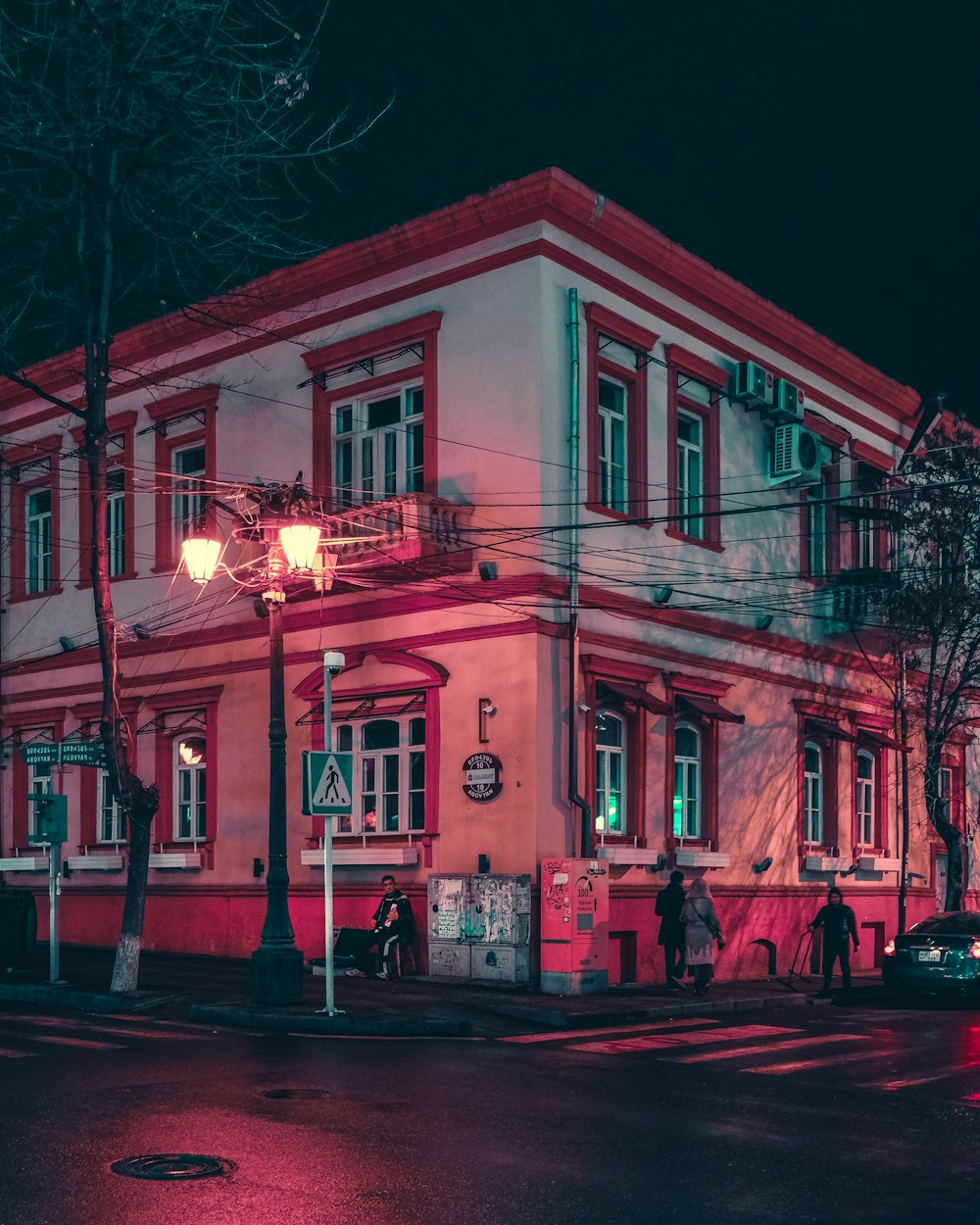 red and white concrete building during night time