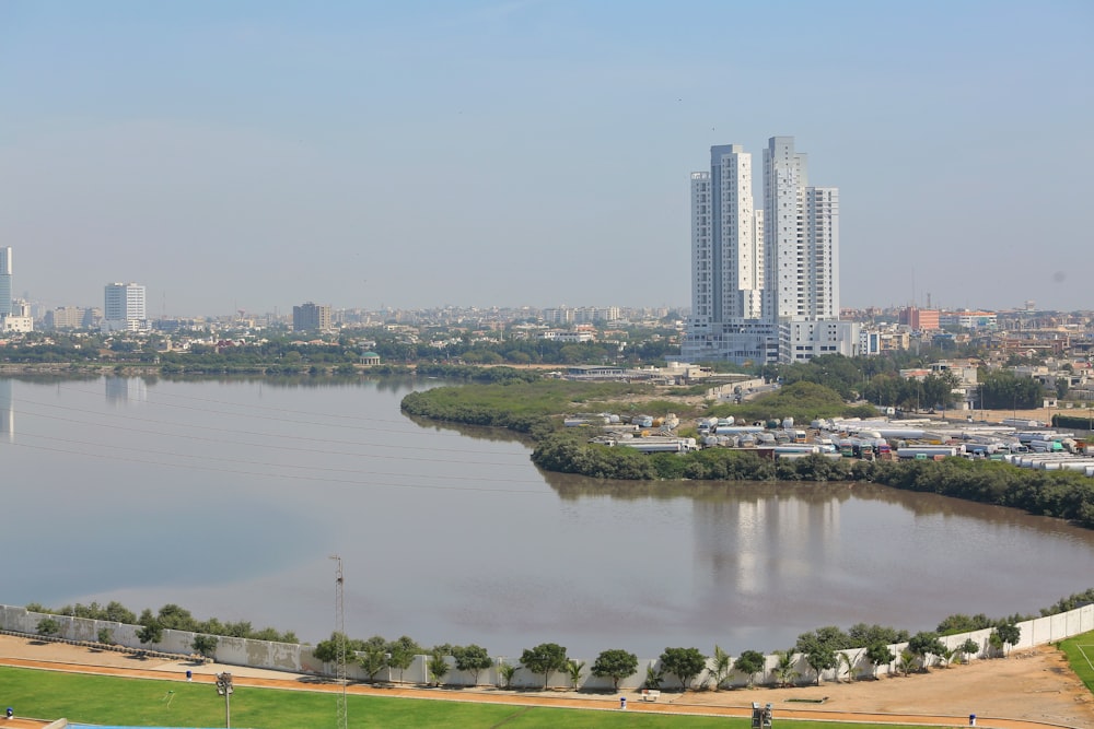 city skyline near body of water during daytime