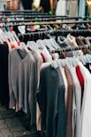 gray and white long sleeve shirt
