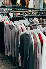 gray and white long sleeve shirt