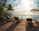 brown wooden lounge chairs on brown wooden dock during daytime