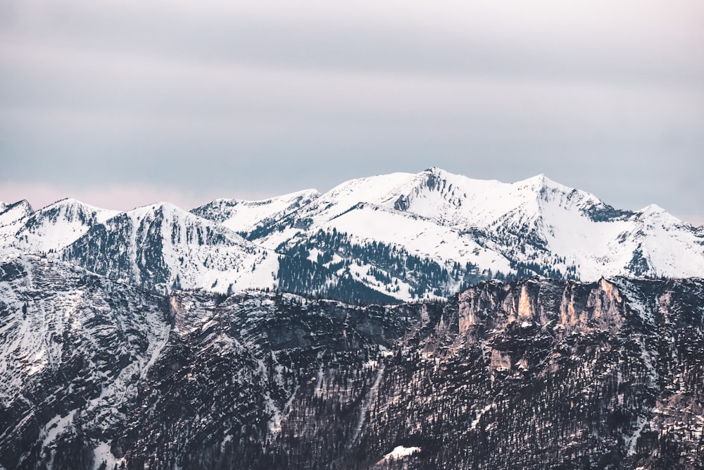 snow covered mountain during daytime