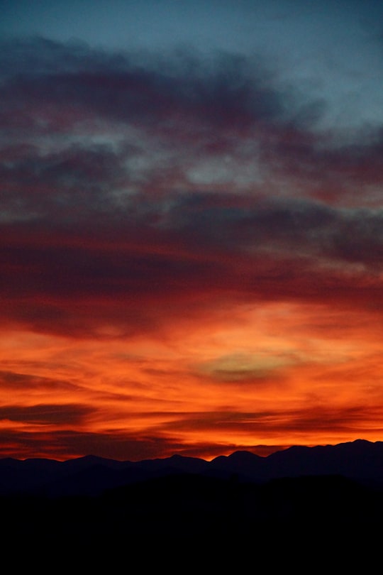 silhouette of mountains under cloudy sky during sunset in Tuzi Montenegro