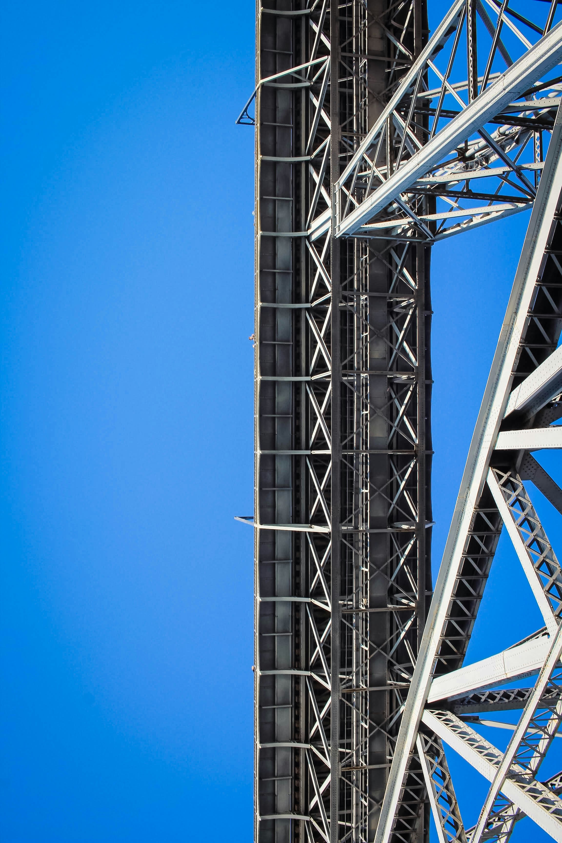 black metal tower under blue sky during daytime