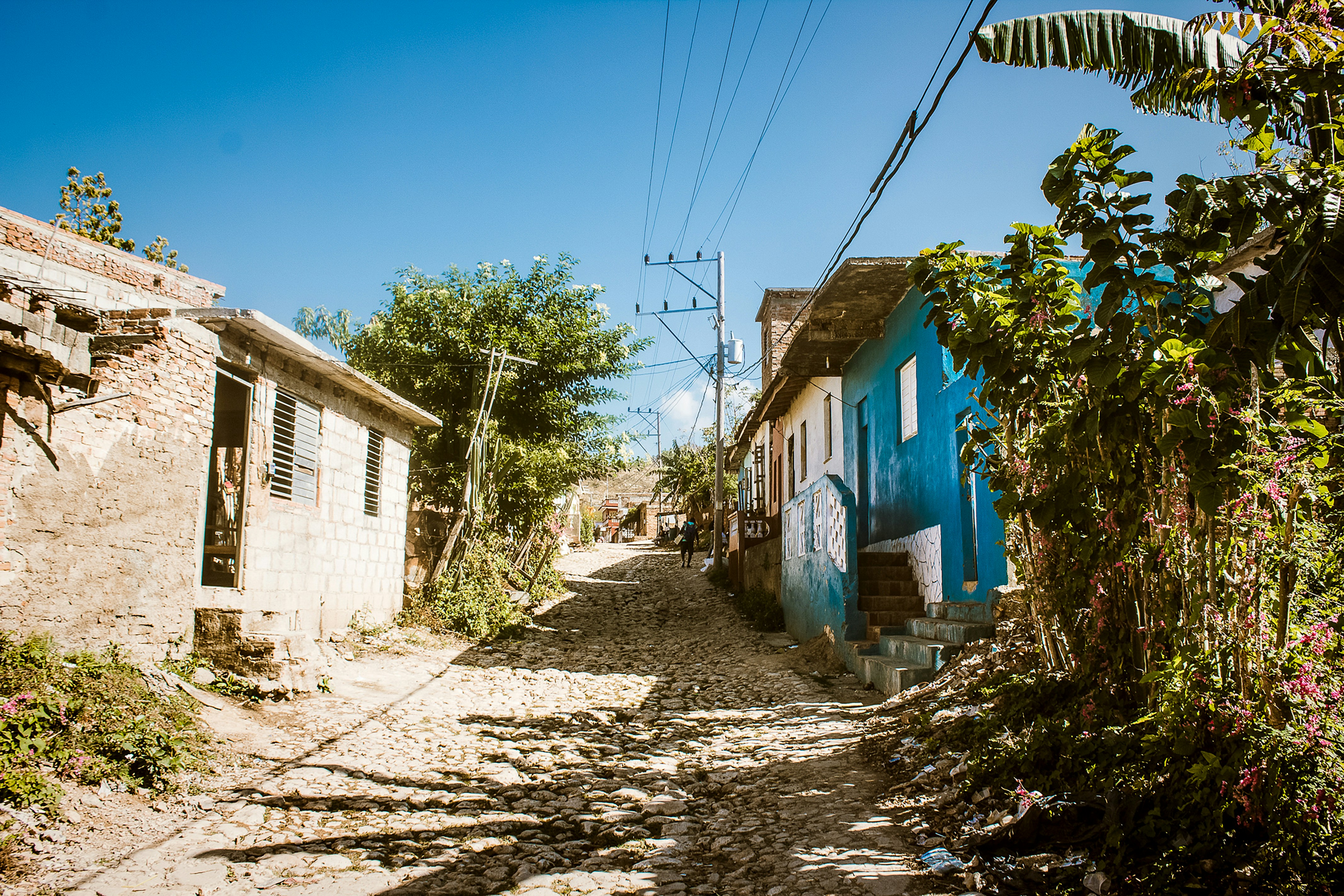 blue and white concrete house under blue sky during daytime