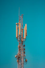 brown and white metal tower under blue sky during daytime
