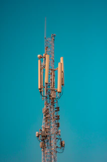 brown and white metal tower under blue sky during daytime